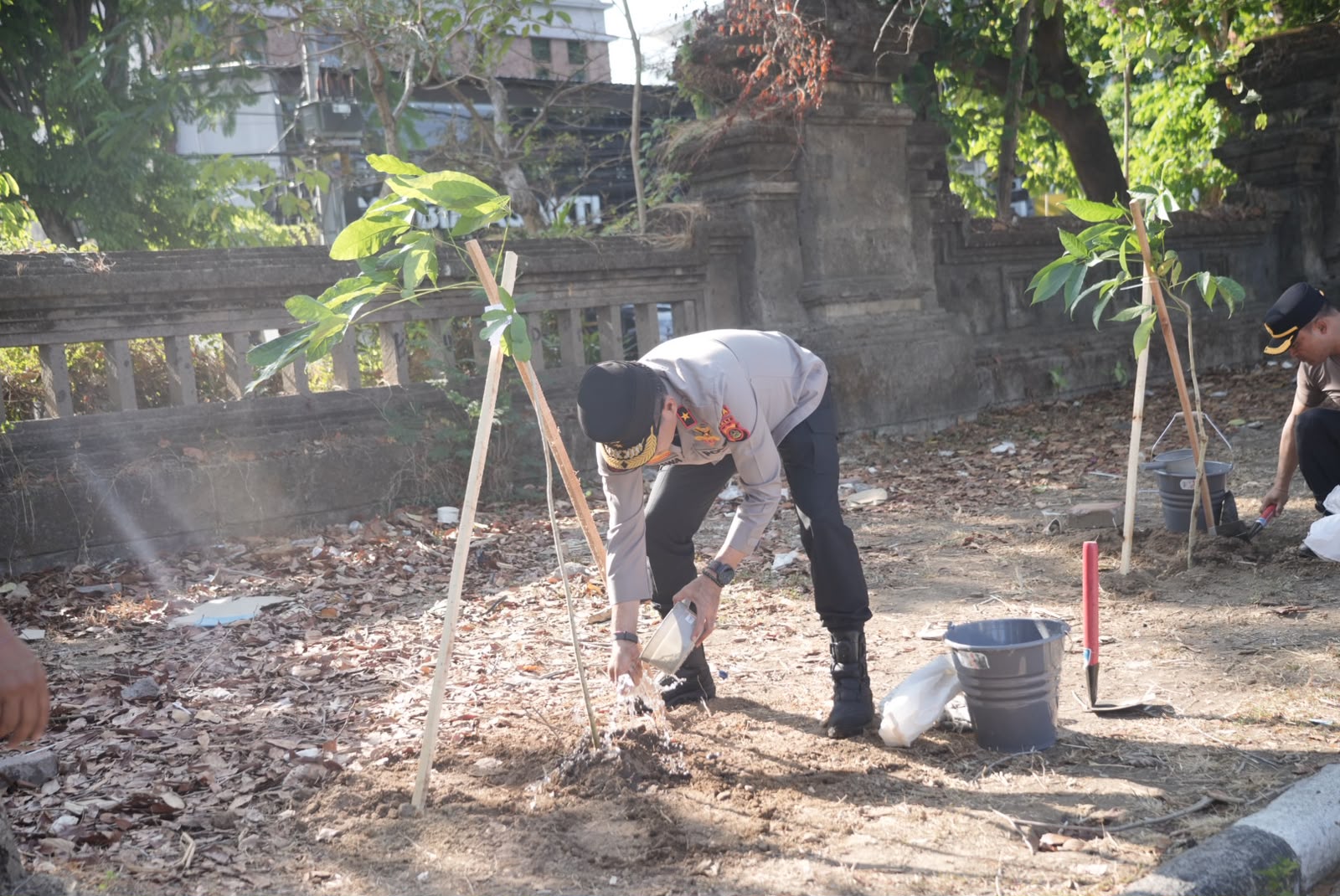 Bali Police Deputy Chief Leads Clean-Up and Tree-Planting Drive in Denpasar