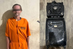 Tersangka SLS diamankan aparat kepolisian. (Istimewa)