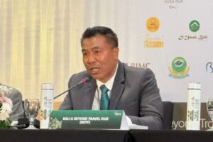 Chairman of ASITA Bali,I Putu Winastra. announcing the upcoming theme of the 12th BBTF 2026.