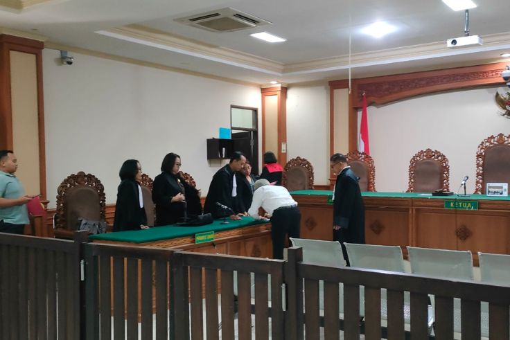 Terdakwa I Wayan Mudana saat menjalani sidang pembacaan vonis di Pengadilan Tipikor Denpasar, Selasa (24/6)