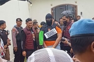 Petugas mengawal ketat proses rekonstruksi penembakan di villa Munggu.