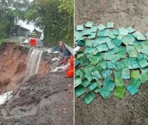 Warga menunjukkan kondisi jalan rusak dan karcis retribusi pajak truk per hari.
