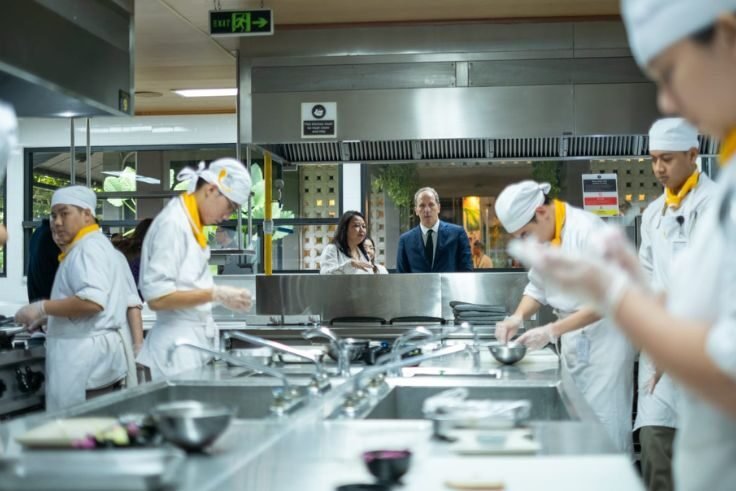 Made Ariani Siswanto, Founder of BCPS, shows the BCPS Kitchen Lab to French Ambassador Fabien Penone during his visit to the BITDeC area in Nyanyi, Tabanan.