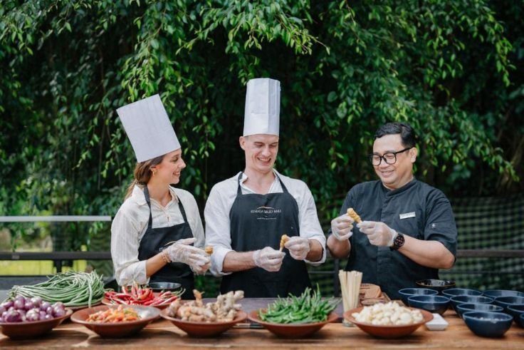 A view of curated luxury and nature experiences offered in Ubud, Bali, with lush tropical landscapes