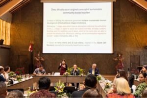 Keynote speaker delivers a presentation during the Sustainable Tourism Business International Symposium (STBis) PNB 2026 at Grand Istana Rama, Kuta, on Friday (March 13).