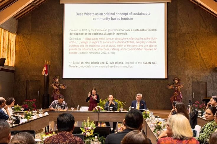 Keynote speaker delivers a presentation during the Sustainable Tourism Business International Symposium (STBis) PNB 2026 at Grand Istana Rama, Kuta, on Friday (March 13).