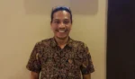 Riando Tambunan, S.H.