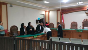 Terdakwa I Wayan Mudana saat menjalani sidang pembacaan vonis di Pengadilan Tipikor Denpasar, Selasa (24/6)