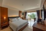 Elegant bedding at Sthala Ubud Bali offers refined comfort with serene views of the lush Wos River Valley.